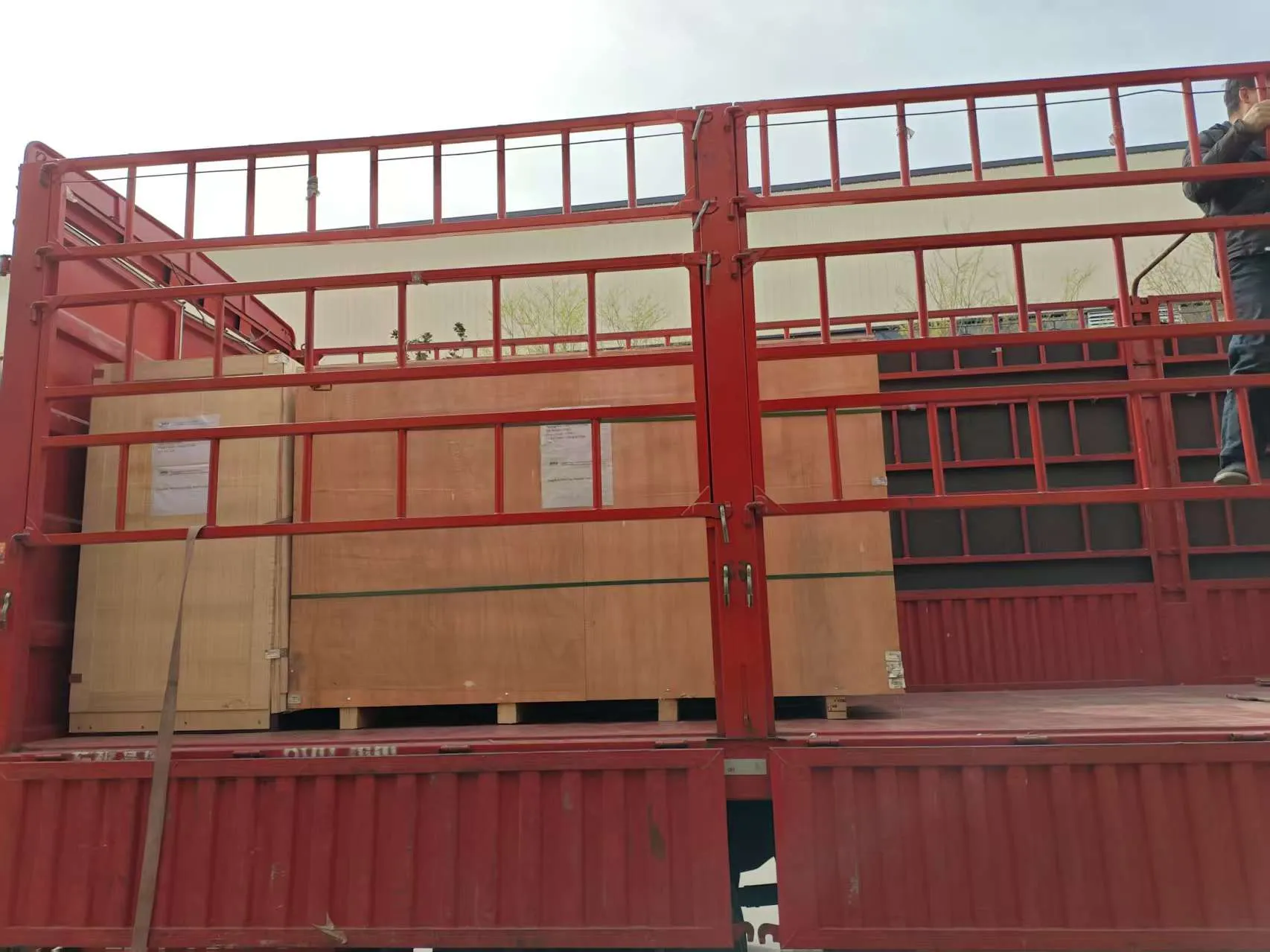 Reinforced export wooden crates with international shipping marks ready for dispatch